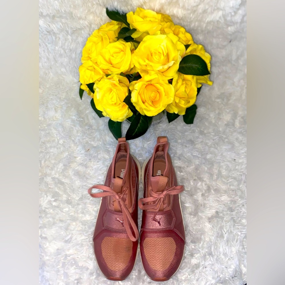 Rose colored Pumas.